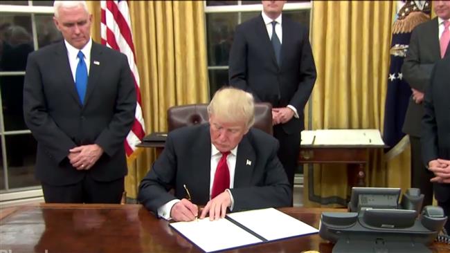 US President Donald Trump signs executive order on Obamacare