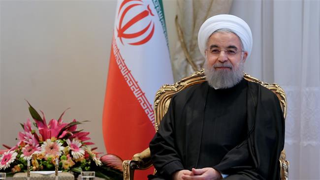 President Rouhani says Iran will break US sanctions