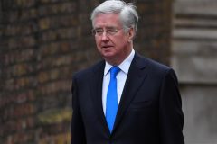 British Defense Secretary resigns over repeatedly touching journalist’s knee