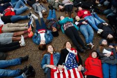 US students stage lie-in protest in front of the White House after Florida school shooting
