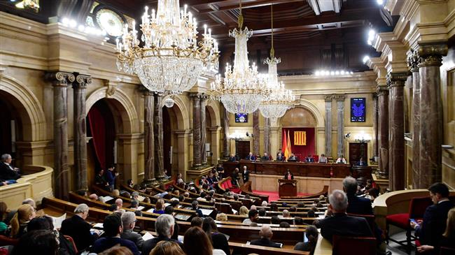 Catalonia parliament backs Puigdemont’s right to lead