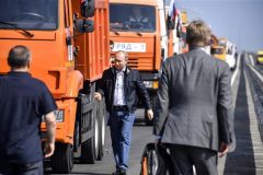 Russia: President Putin drives truck over bridge linking Russia to Crimea