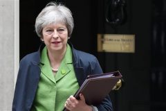 May defuses revolt in parliament over Brexit plans