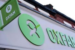 Oxfam to cut projects, staff after Haiti sex scandal