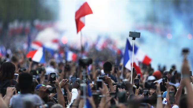France: Fans welcome their World Cup champions on the Champs Elysees