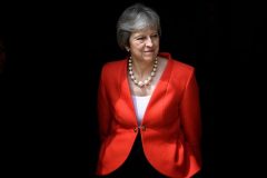 Britain’s May narrowly avoids customs union vote defeat