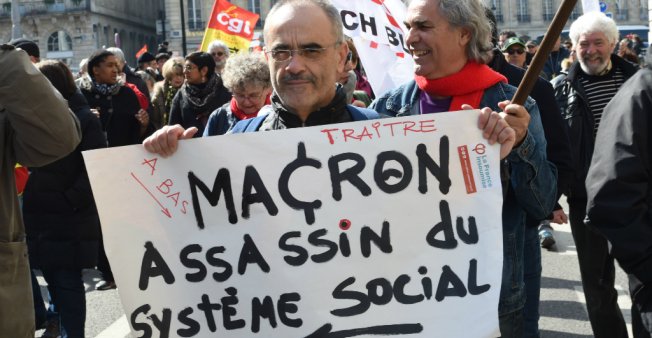French unions to strike over Macron’s ‘destruction of social model’