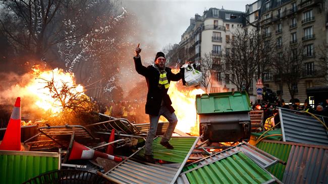 Paris: Tear gas billows as ‘Yellow Vests’ protest against President Macron