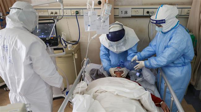 China reports rise in new virus cases as death toll nears 1,800