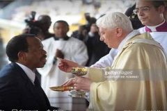 Why is this evil man still receiving Holy Communion?