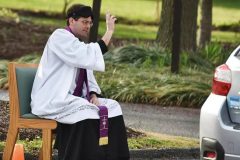 With churches closing, US priest offers drive-thru confessions