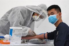 China reports highest number of new Covid-19 cases in nearly 3 weeks