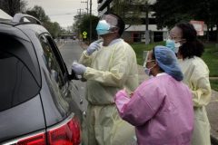 African American WHO says Coronavirus ‘may never go away’