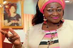 Paris: French Cameroun Minister leaves church by side door surrounded by family