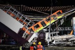 Mexico train accident Mexico City rail overpass collapses onto road, killing 20 people