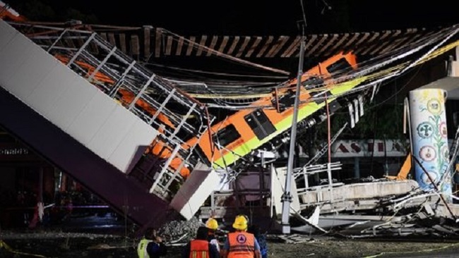 Mexico City rail overpass collapses onto road, killing 20 people