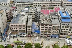 Dozens trapped in China building collapse