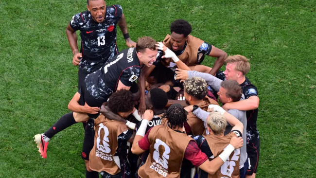 World Cup: Canada reach last 16 with stoppage-time win over South Africa