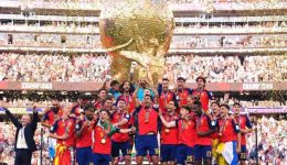Trump greeted with boos, lingers on stage to lap up World Cup spotlight