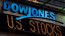 Dow hits fresh record as oil prices tumble